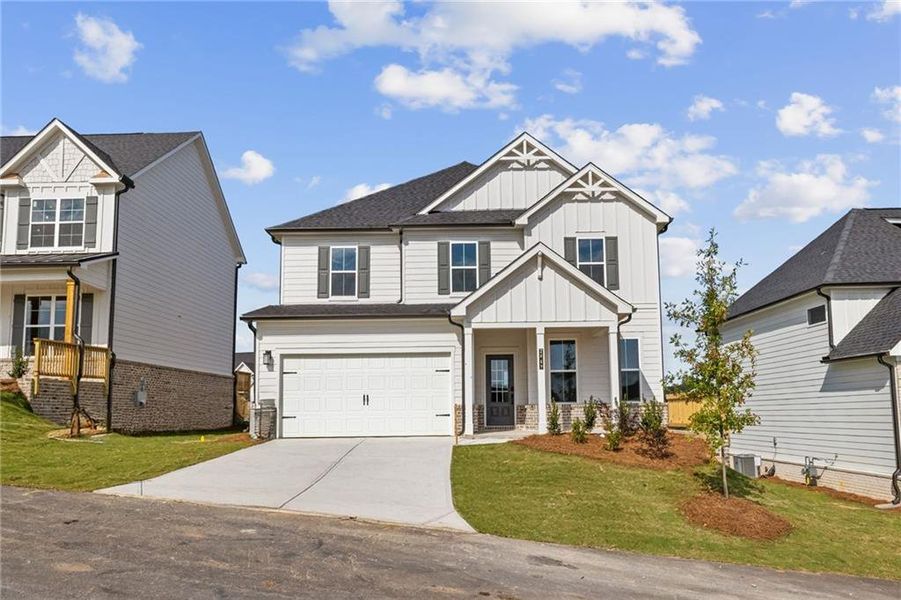 Front exterior of a new home in The Estates at Gainesville Township, Gainesville, GA, highlighting curb appeal (Image 2).