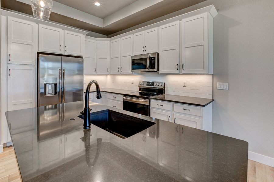 Representative furnished interior of a home built from the The Camden 2 by Landmark Homes in Highlands at Fox Hill, Longmont (Image 7).
