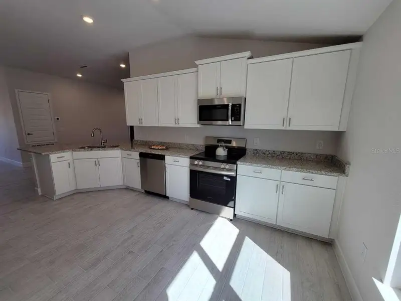 Furnished interior view inside a new home in Ocala Crossings South, Ocala (Image 4).