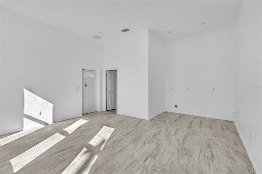 Spacious, unfurnished interior of a new home in , Port Charlotte (Image 27).