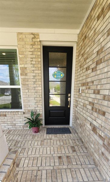 Exterior details and patio area of a home in Anniston, Katy (Image 4).