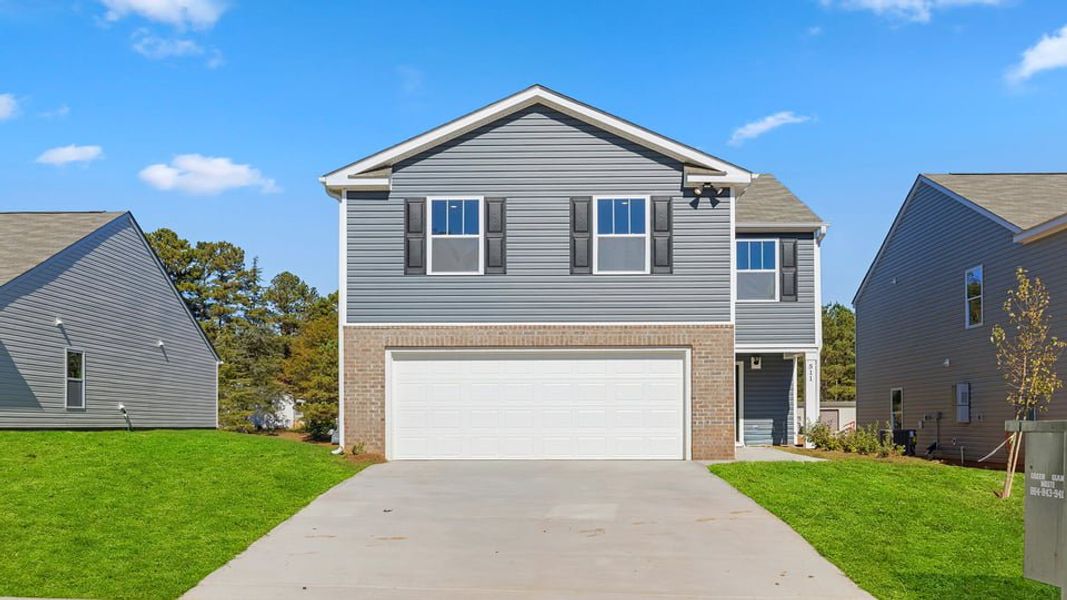 Front exterior of a new home in Seneca Falls, Seneca, SC, highlighting curb appeal (Image 1).