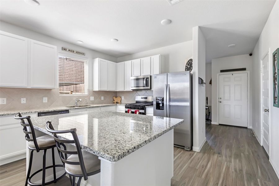 Furnished interior view inside a new home in Granger Pines, Conroe (Image 6).