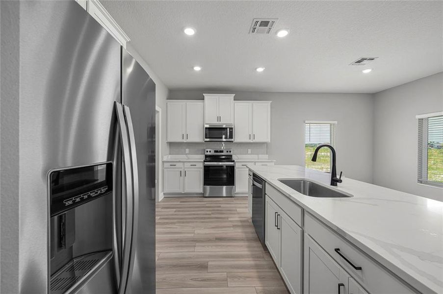 Furnished interior view inside a new home in Gum Lake Preserve, Lake Alfred (Image 9).