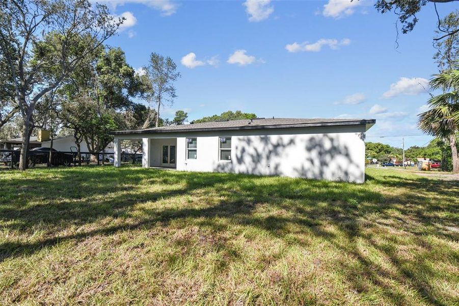 Exterior details and patio area of a home in , Spring Hill (Image 17).