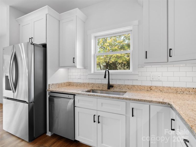 Furnished interior view inside a new home in , Waynesville (Image 11).