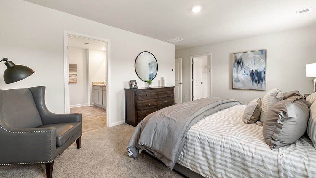 Representative furnished interior of a home built from the ROBIE by D.R. Horton in Pointe Park, Union City (Image 23).