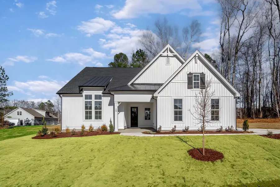 Representative exterior photo of a completed home built from the The Bradley by RobuckHomes in Baylee Ridge, Selma, NC (Image 66). Representative exterior photo of a completed home built from the The Bradley by RobuckHomes in Baylee Ridge, Selma, NC (Image 66).