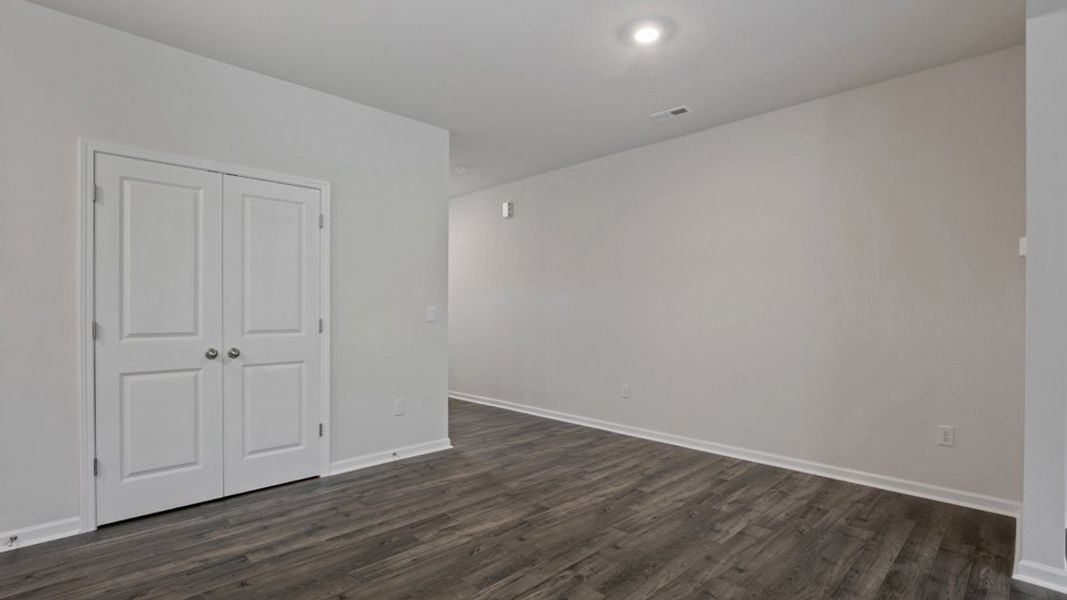 Spacious, unfurnished interior of a new home in The Grove at Matthews Landing, Fuquay Varina (Image 13).