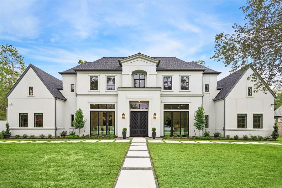 Front exterior of a new home in , Houston, TX, highlighting curb appeal (Image 21).
