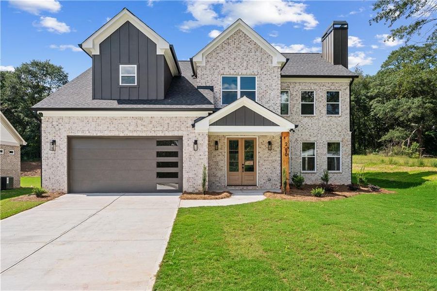 Front exterior of a new home in , Lawrenceville, GA, highlighting curb appeal (Image 25).