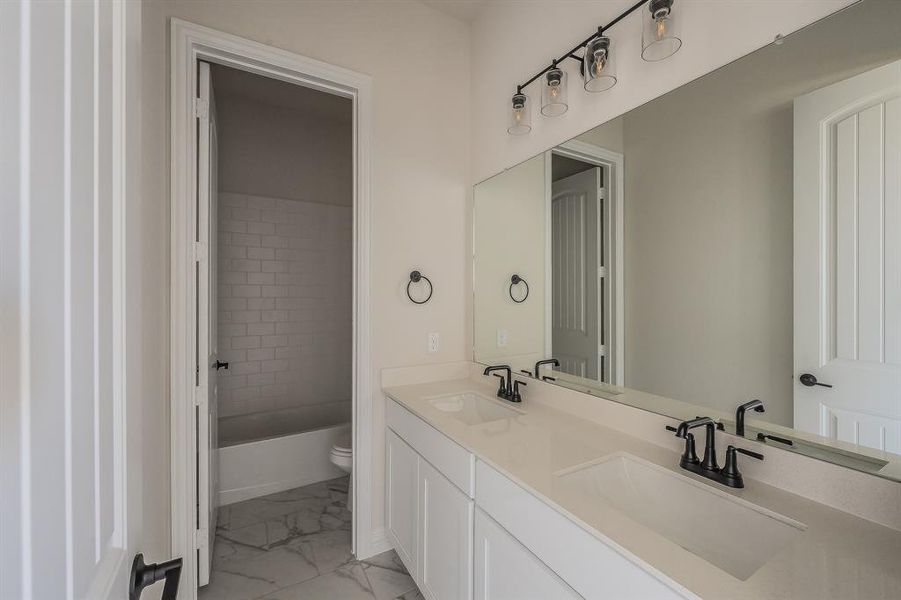 Furnished interior view inside a new home in Matthews Farms, Venus (Image 13).