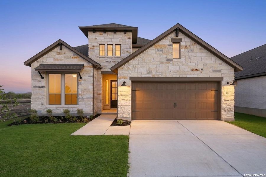 Front exterior of a new home in Nopal Valley, San Antonio, TX, highlighting curb appeal (Image 26). Front exterior of a new home in Nopal Valley, San Antonio, TX, highlighting curb appeal (Image 26).