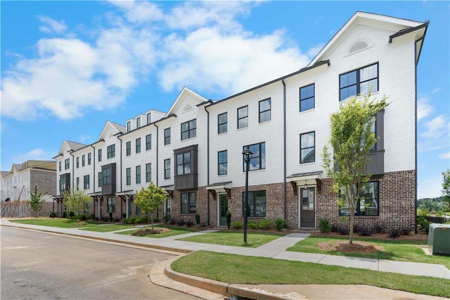 Front exterior of a new home in Millcroft Townhomes, Buford, GA, highlighting curb appeal (Image 20).