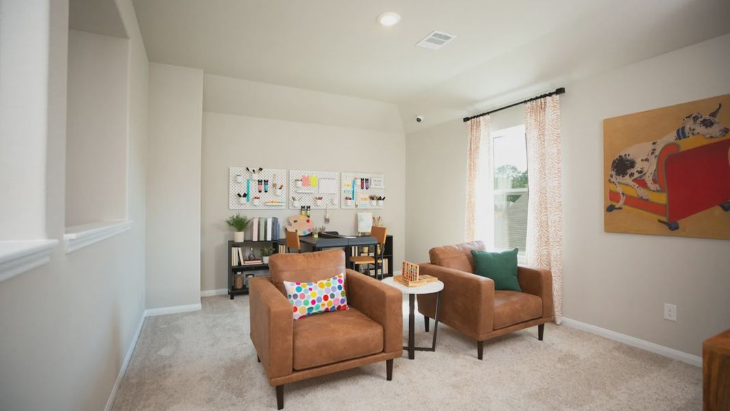Representative furnished interior of a home built from the The Woodland by Legend Homes in Granger Pines, Conroe (Image 12).