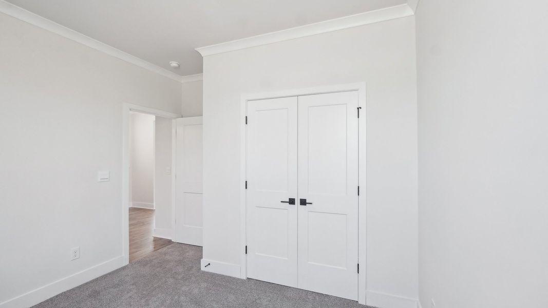 Representative unfurnished interior of a home built from the Sycamore by D.R. Horton in Westport, York (Image 28).