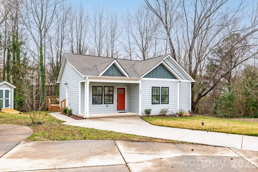 Front exterior of a new home in , Charlotte, NC, highlighting curb appeal (Image 21).
