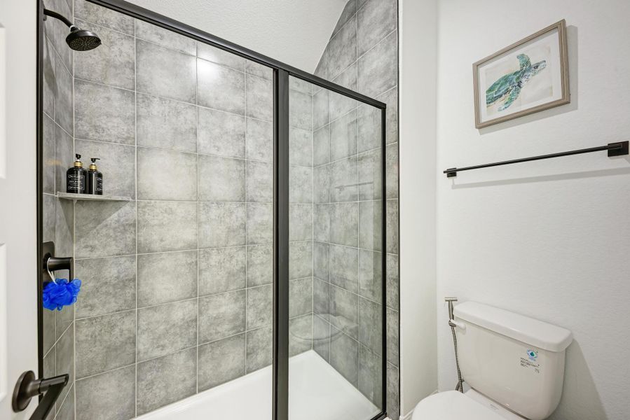 Bathroom with a stall shower