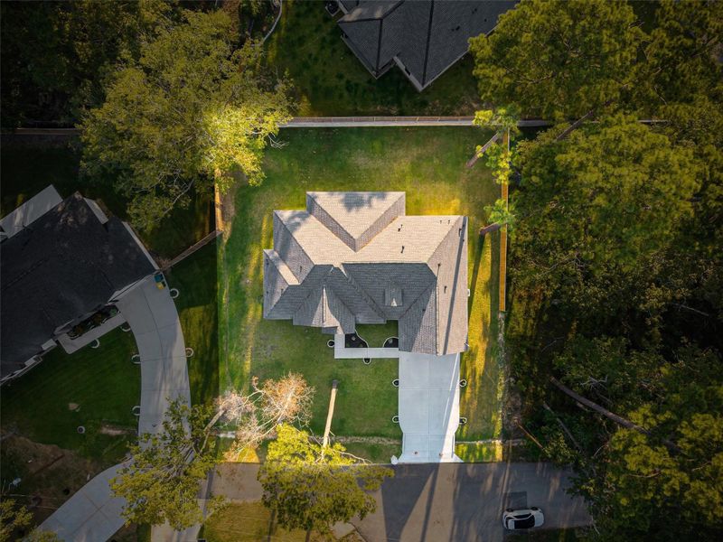 Front exterior of a new home in , Conroe, TX, highlighting curb appeal (Image 21).