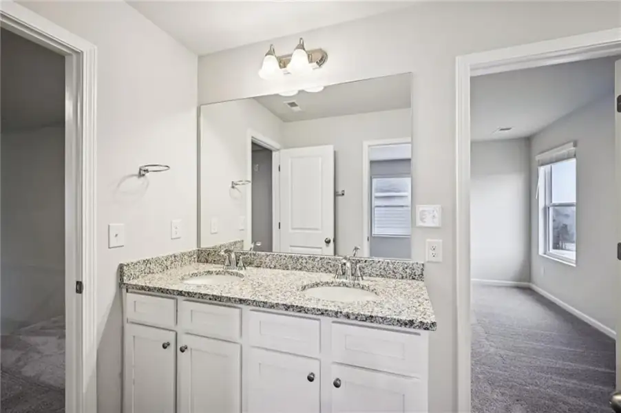 Furnished interior view inside a new home in The Hills at Cedar Creek, Winder (Image 8).