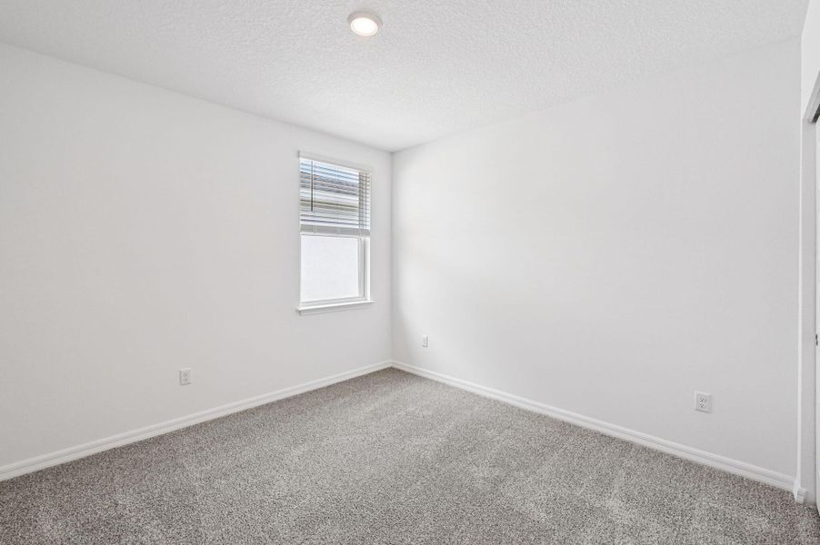 Spacious, unfurnished interior of a new home in Hampton Park - Classic Series, Vero Beach (Image 14).