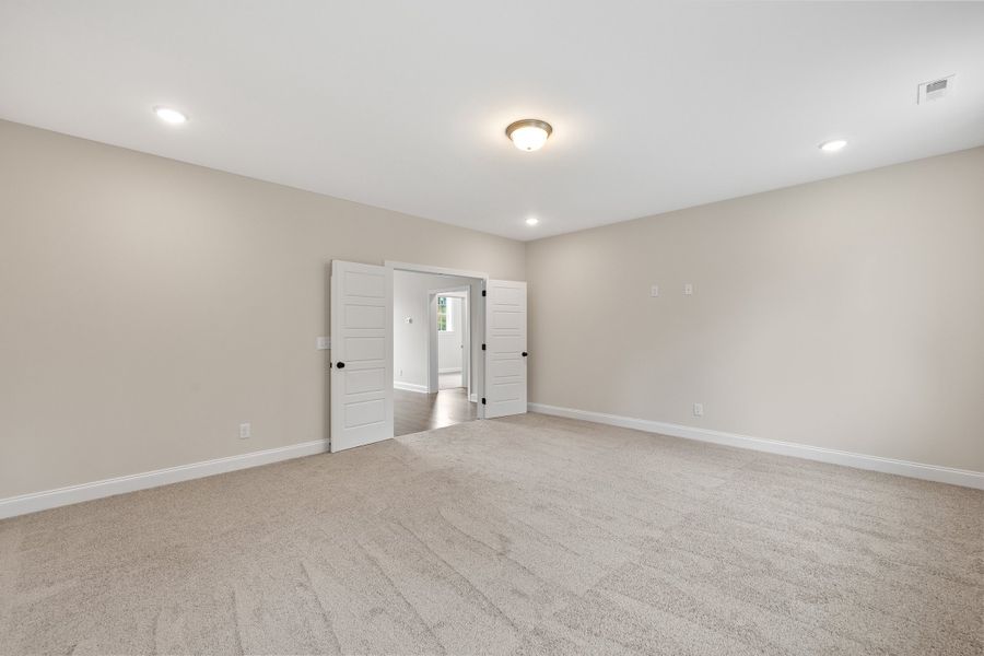 Representative unfurnished interior of a home built from the The Chandler by RobuckHomes in Baylee Ridge, Selma (Image 200).