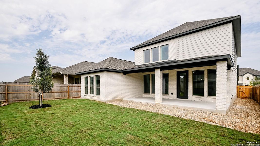 Exterior details and patio area of a home in Legacy At Lake Dunlap 50', New Braunfels (Image 22). Exterior details and patio area of a home in Legacy At Lake Dunlap 50', New Braunfels (Image 22).