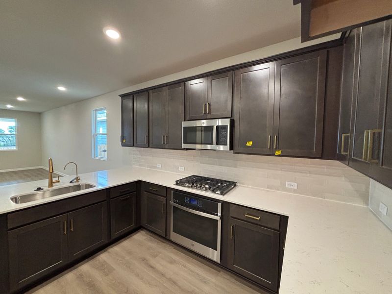 Furnished interior view inside a new home in Cannon Ranch 45s, Dripping Springs (Image 6).