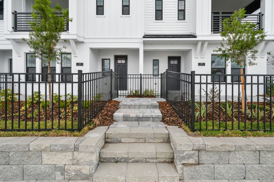 Exterior details and patio area of a home in Emerald Landing at Waterside at Lakewood Ranch – City Homes, Sarasota (Image 29).