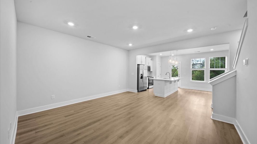 First-rate hardwood flooring and thoughtful upgrades in this select townhome by DRB Homes at Saluda Crossing in Piedmont, SC