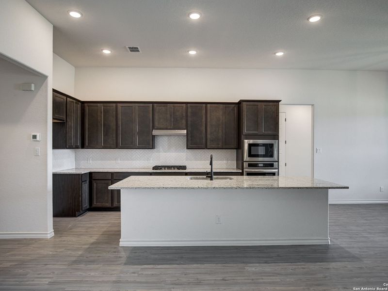 Furnished interior view inside a new home in The Reserve at Potranco Oaks, Castroville (Image 8).