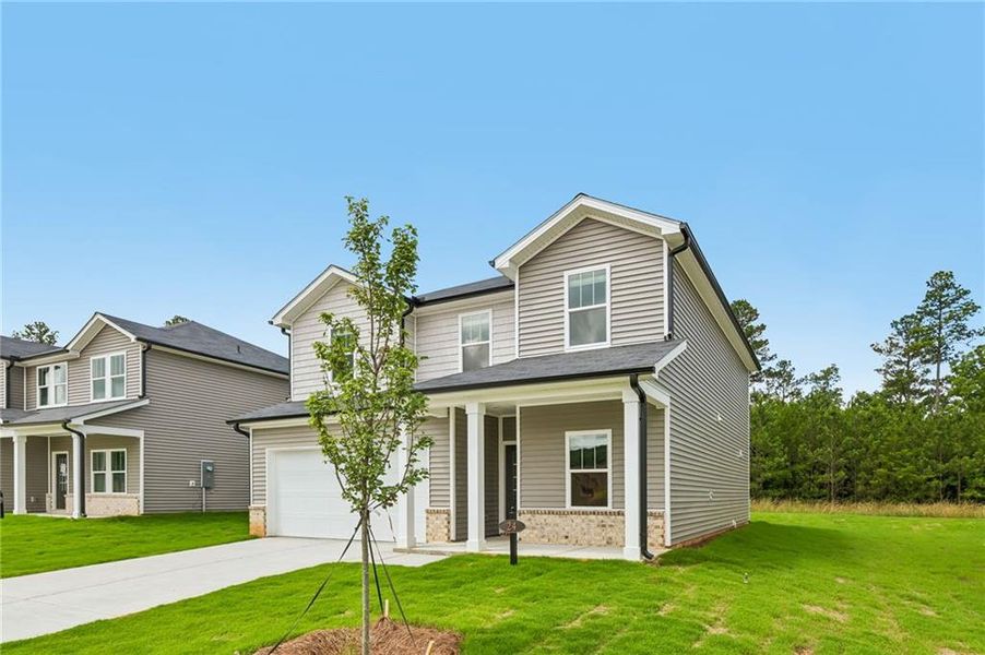 Front exterior of a new home in Manning Mill, Adairsville, GA, highlighting curb appeal (Image 2). Front exterior of a new home in Manning Mill, Adairsville, GA, highlighting curb appeal (Image 2).