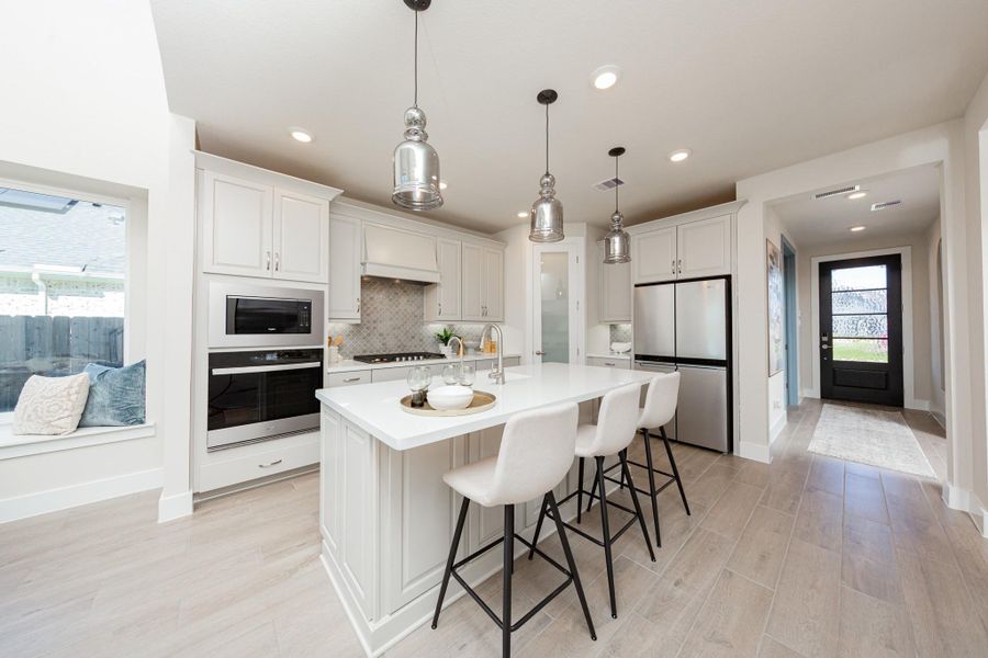 Kitchen. Representative model home photos shown for illustrative purposes only. Actual home, features, and finishes may vary. Home is currently under construction.