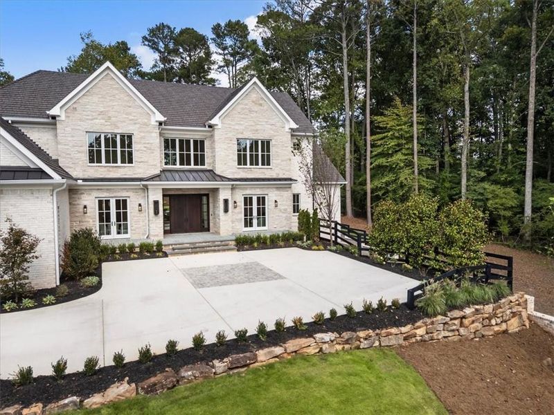 Front exterior of a new home in , Milton, GA, highlighting curb appeal (Image 28). Front exterior of a new home in , Milton, GA, highlighting curb appeal (Image 28).