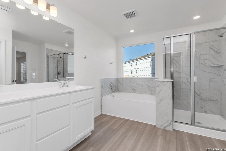 Furnished interior view inside a new home in Preserve at Culebra - Heritage Collection, San Antonio (Image 5).
