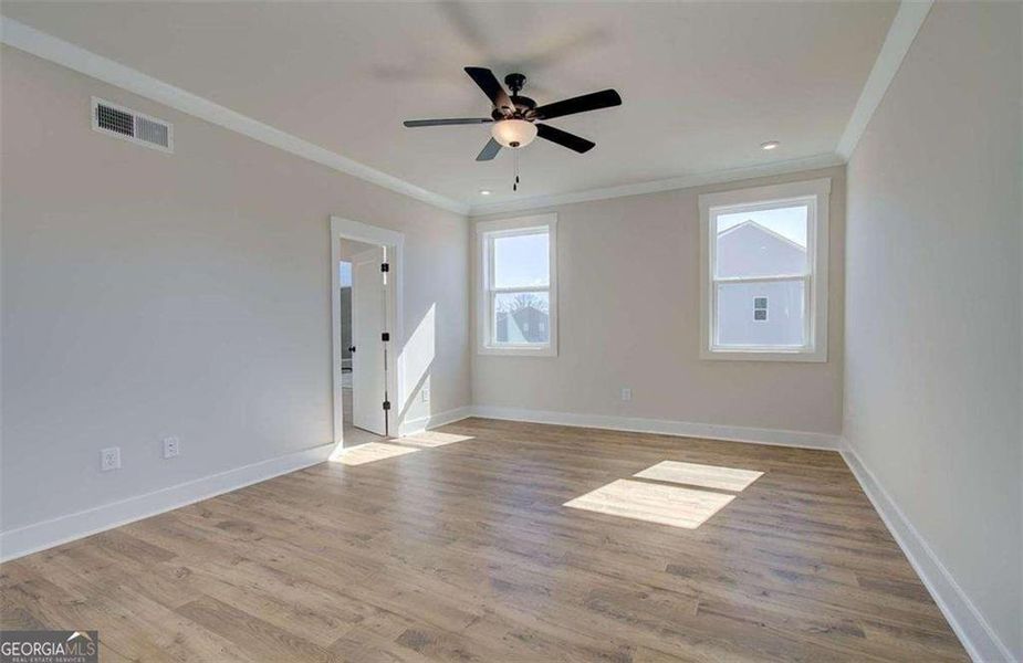Spacious, unfurnished interior of a new home in The Paddocks at Doc Hughes, Buford (Image 40).