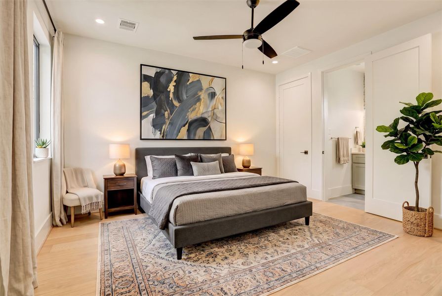 One of two third-floor secondary bedrooms with ensuite bathrooms.