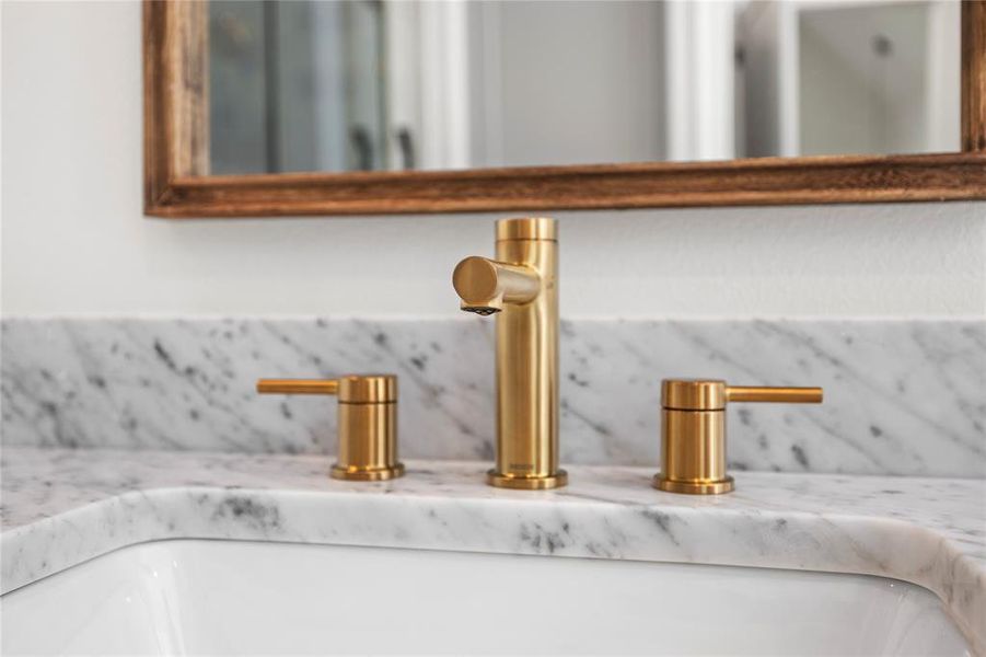 Bathroom view of backsplash and vanity