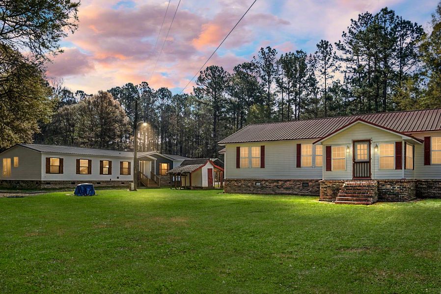 Exterior details and patio area of a home in , Bonneau (Image 31).