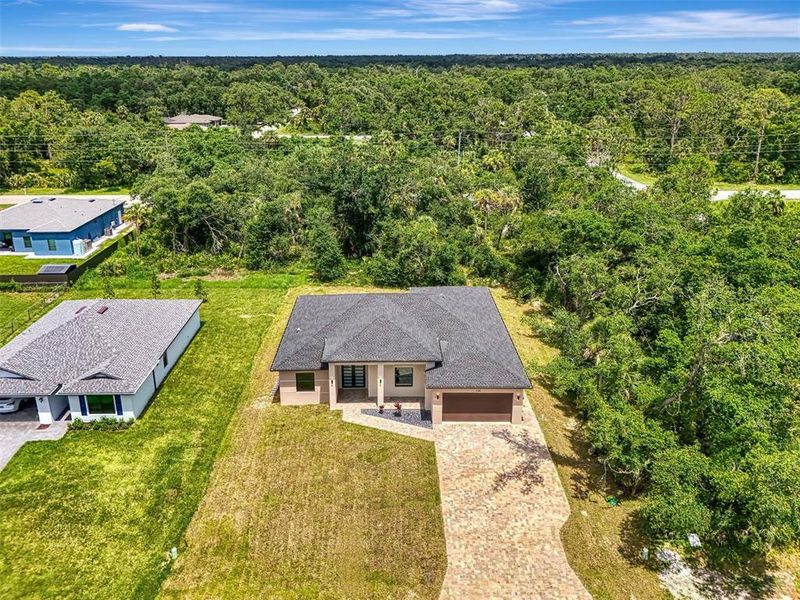 Front exterior of a new home in , Port Charlotte, FL, highlighting curb appeal (Image 34).