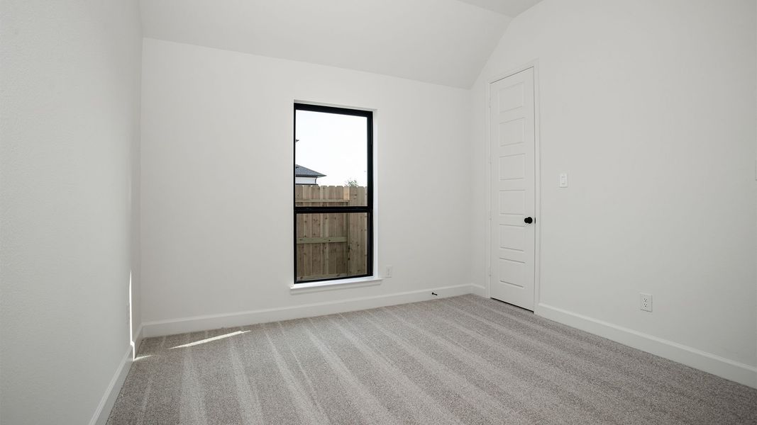 Spacious, unfurnished interior of a new home in Legacy Prairie at Katy Court, Katy (Image 17).