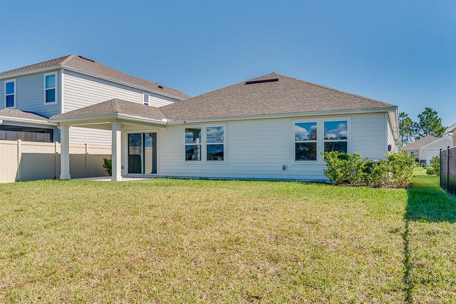 Exterior details and patio area of a home in Somerset - Executive Series, Palm Coast (Image 15).