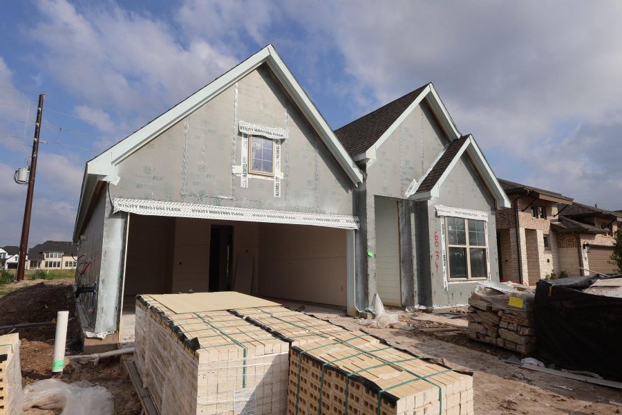 In-progress construction of a new home in Meridiana - Terrace Collection, Manvel, TX (Image 3).
