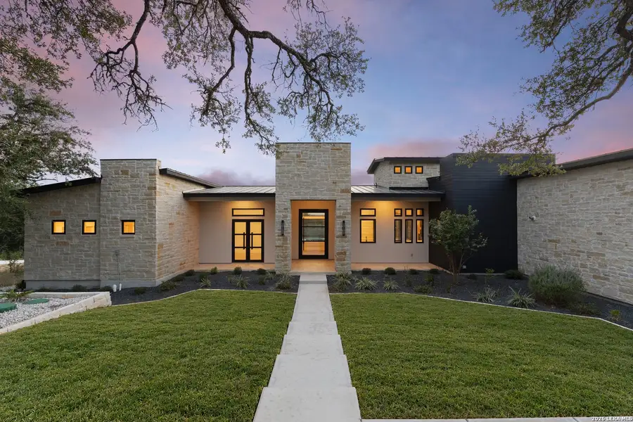 Front exterior of a new home in , Canyon Lake, TX, highlighting curb appeal (Image 32).