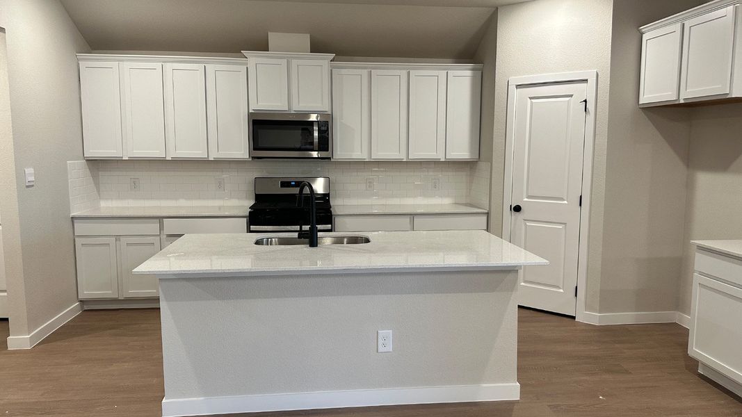 Furnished interior view inside a new home in The Lakes Northwest, Robstown (Image 8).