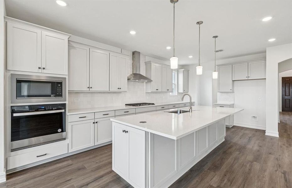 Open kitchen layout perfect for entertaining and creating a connected home environment  *Real home pictured