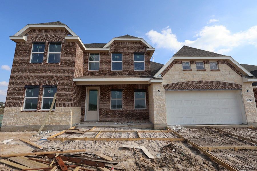 Two story home with 4 beds, 3.5 baths, and 2 car garage