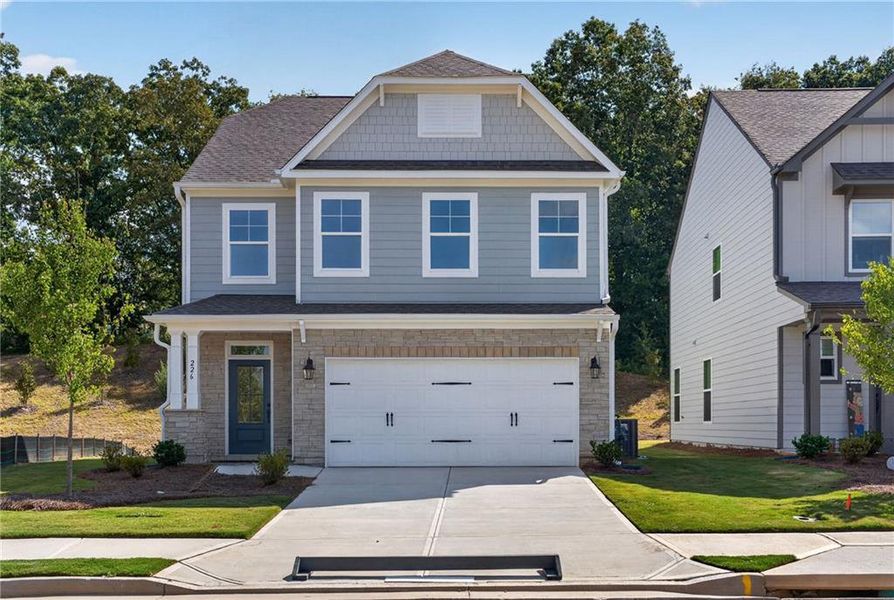 Front exterior of a new home in Villas at Dawsonville, Dawsonville, GA, highlighting curb appeal (Image 23). Front exterior of a new home in Villas at Dawsonville, Dawsonville, GA, highlighting curb appeal (Image 23).