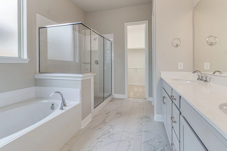 Primary bath. Note: Sample product photo. Actual exterior and interior selections may vary by homesite. Photo may be virtually staged