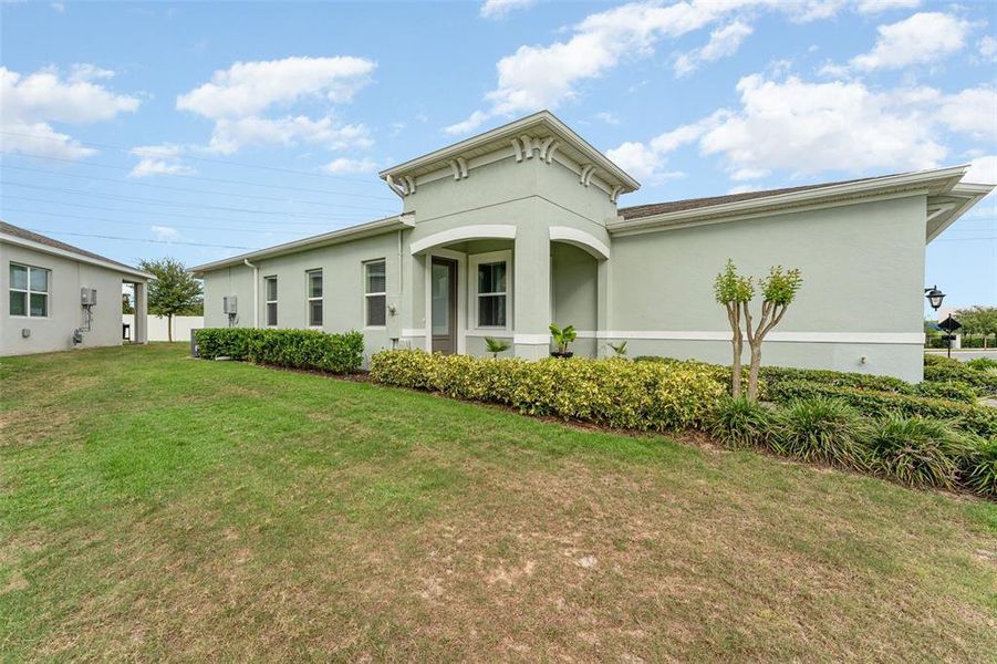 Front exterior of a new home in , Kissimmee, FL, highlighting curb appeal (Image 18).